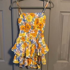 Floral open back romper!